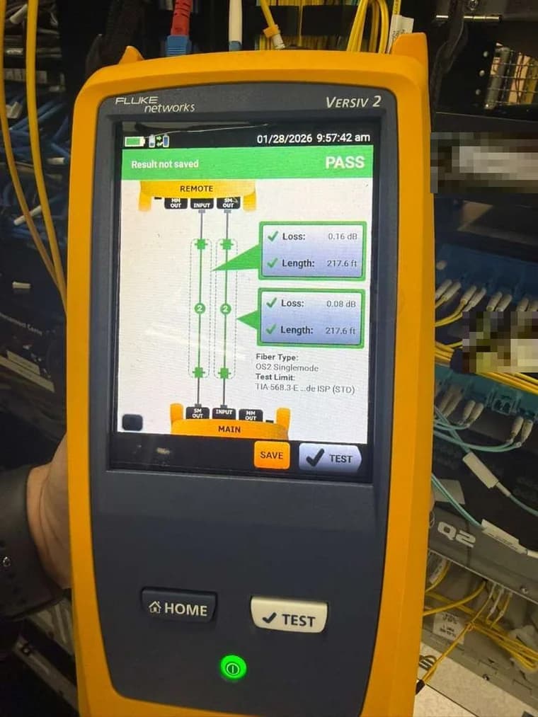 Screen of a Fluke Versiv 2 showing a PASS result for a singlemode fiber link: 0.16 dB loss over 217.6 ft, against the TIA-568.3-E limit.